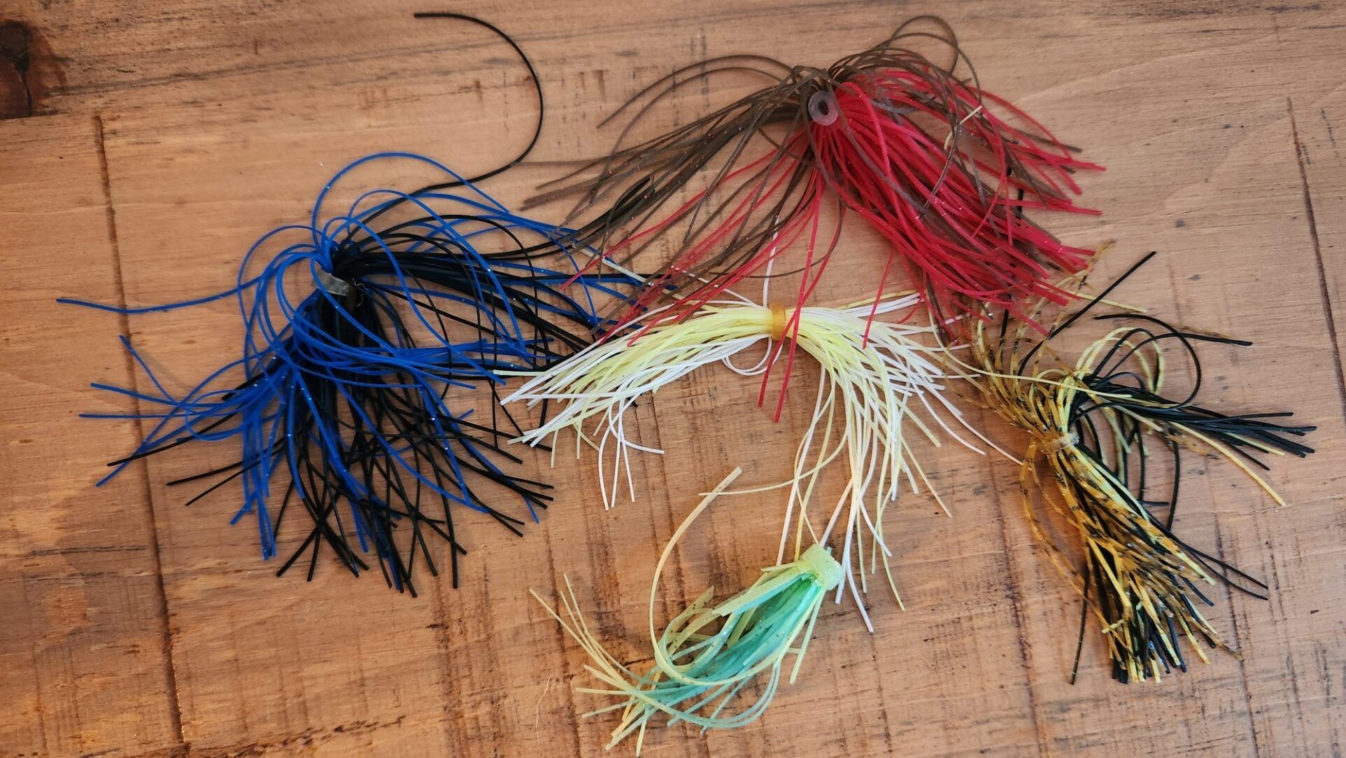Different colors of silicone skirts for spinnerbaits.
