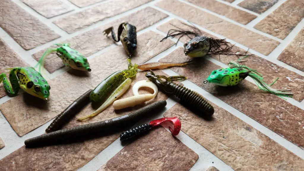Several soft plastic lures. Worms, tubes and frogs.